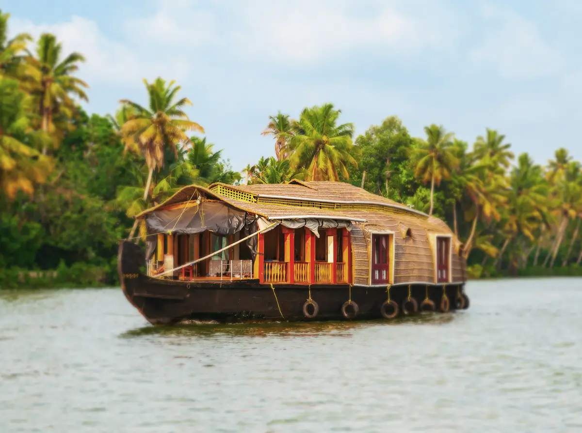 A houseboat sailing in Alappuzha backwaters in Kerala state in India