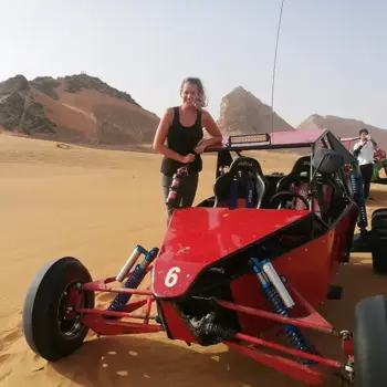 Lydia - dune buggy in Dubai Lydia standing beside a dune buggy in Dubai