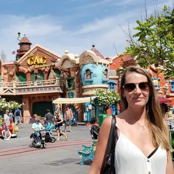 Lydia at Disneyland Lydia standing in front of a Disneyland attraction
